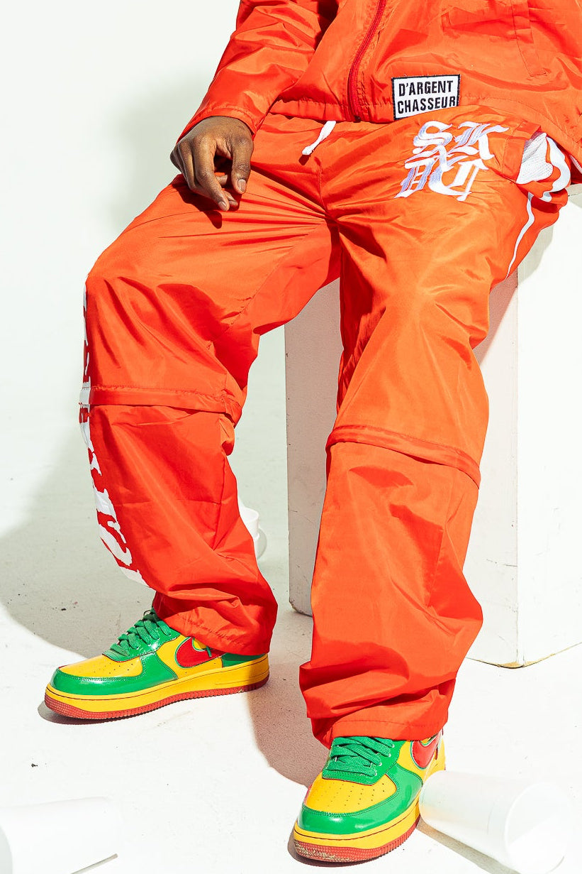 CONVERTIBLE RED TRACKPANTS